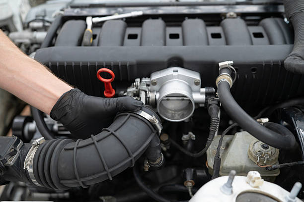 istock Car Mechanic Works on Disassembling Intake System in Garage During Vehicle Maintenance Process 2213863591