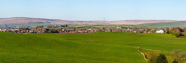 istock Tandle Hill green fields panorama at Sunset 2213867684