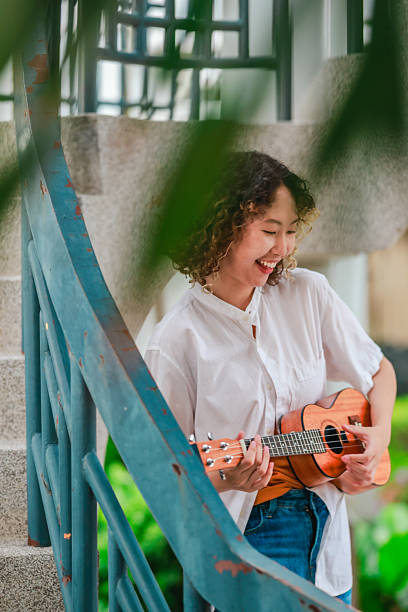 istock Joyful Ukulele Performance Outdoors 2213868489