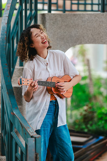 istock Joyful Ukulele Performance Outdoors 2213868492