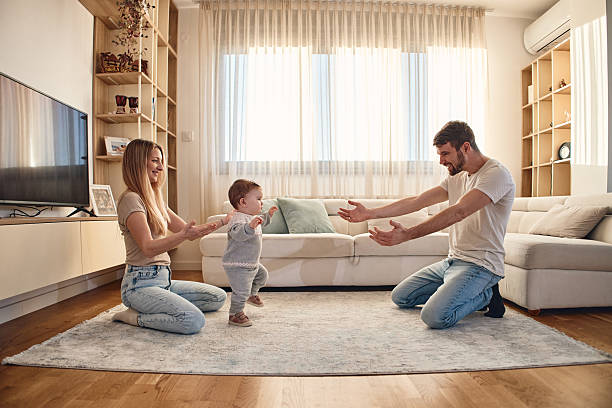 istock First steps of our baby 2213870955