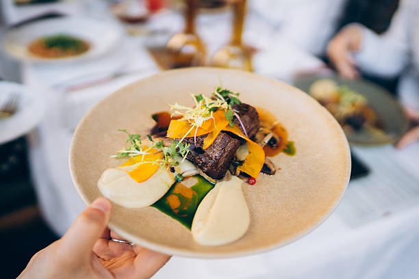 istock Gourmet dish served elegantly with fresh ingredients at a fine dining restaurant during the evening 2213873177