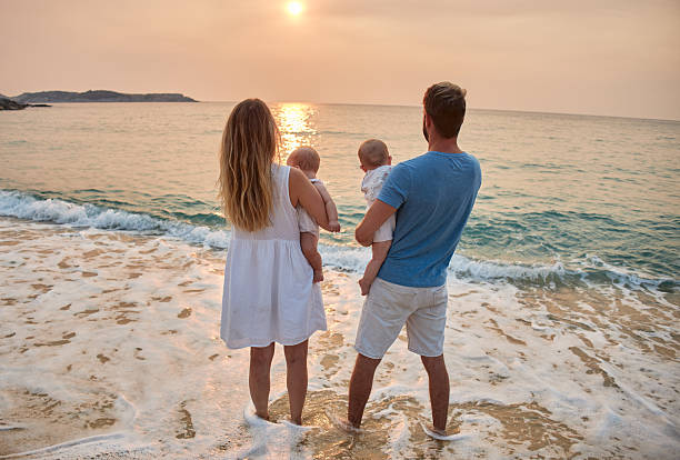 istock A family enjoying a tropical paradise beach during sunset 2213874135