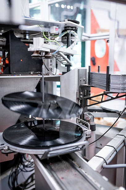istock Vinyl record press factory machinery 2213878494