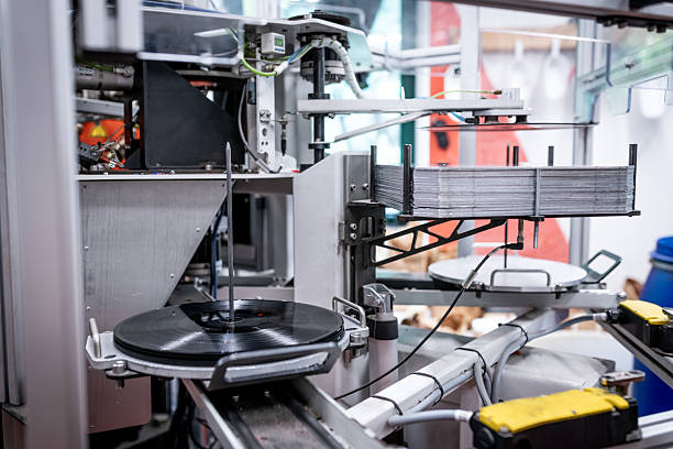 istock Vinyl record press factory machinery 2213878530