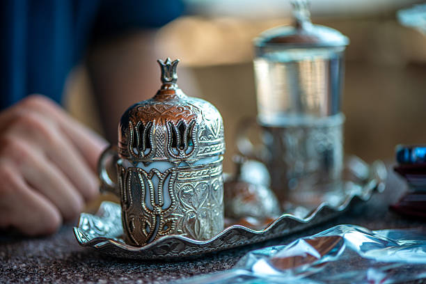istock Traditional Turkish Copper Coffee Cup on Ancient Stone, Lid Opening 2213880085