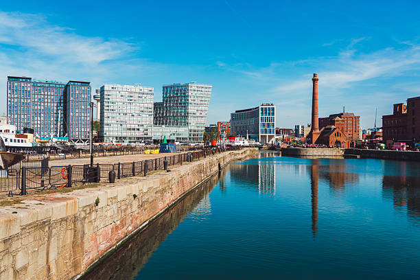 istock Stanley dock reflecting in the water in liverpool, england 2213880878