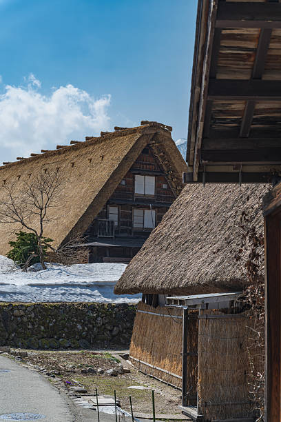 Snow melts in Shirakawa-go Gassho-style houses in the remaining snow