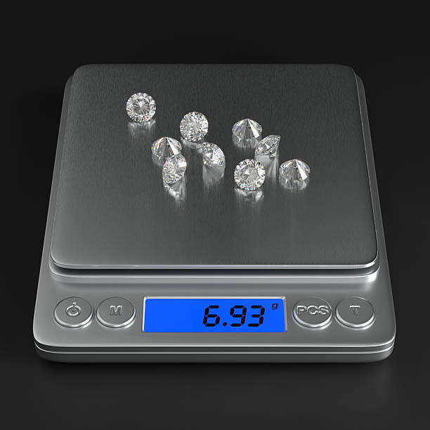 Precise digital scales with round cut diamonds on the black background. Front view. 3d rendering. stock photo