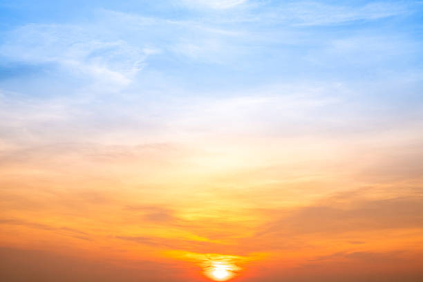 istock Beautiful , luxury soft gradient orange gold clouds and sunlight on the blue sky perfect for the background, take in evening,Twilight, Large size, high definition landscape photo 2213895260