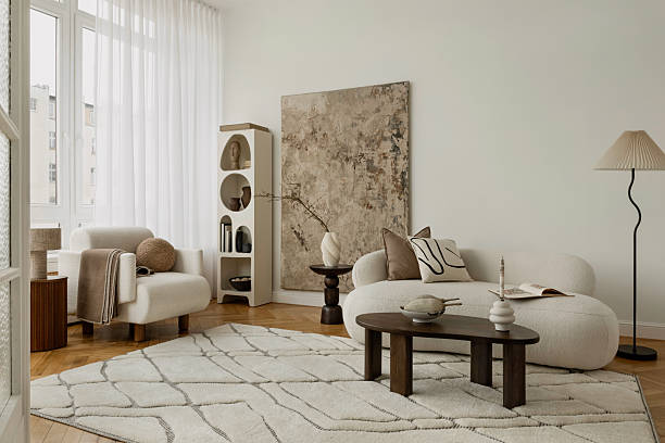 istock Warm and inviting interior with cozy seating, soft light, and textural details. 2213897434