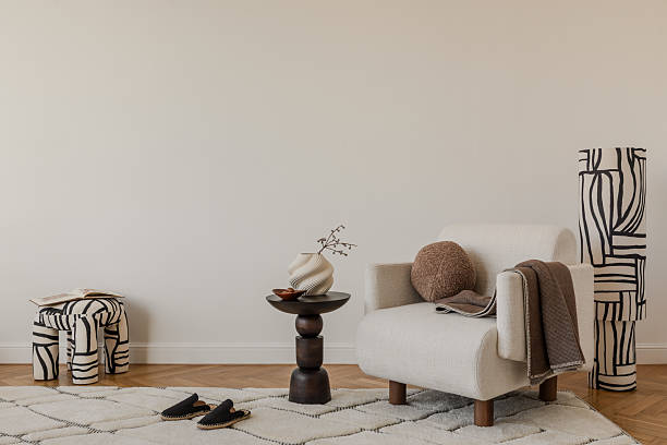 istock Elegant beige sofa, abstract pillows and organic decor elements in a calm, modern interior. 2213897629
