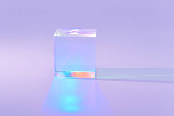 istock Iridescent crystal cube casting a dreamy shadow on a purple background 2213897715