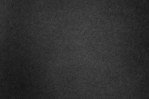 istock Black paper material macro closeup with grains details 2213899920