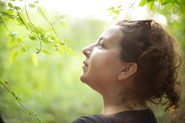 istock Woman enjoying nature 2213902547