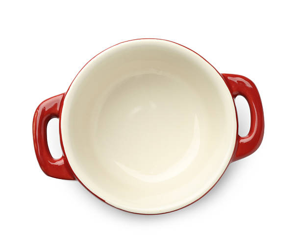 istock One ceramic casserole isolated on white, top view. Cooking utensil 2213903034