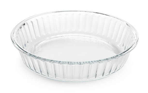 istock One glass casserole isolated on white. Cooking utensil 2213903134