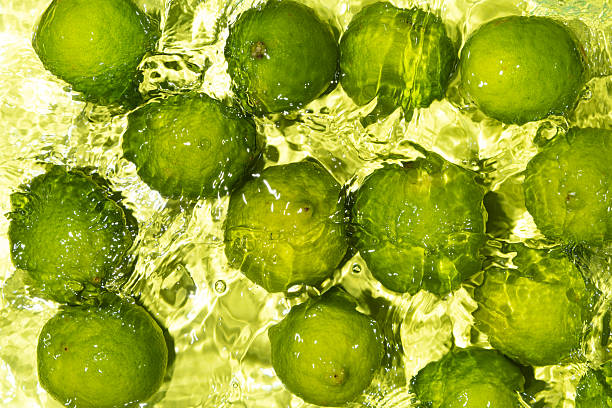 istock Citrus Vibes Fresh Limes in Clear Liquid 2213904977