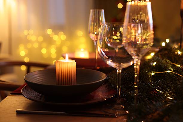 istock Festive table setting in room decorated for Christmas, closeup. Bokeh effect 2213905008
