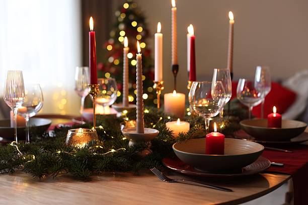 istock Festive table setting in room decorated for Christmas, closeup. Bokeh effect 2213905048