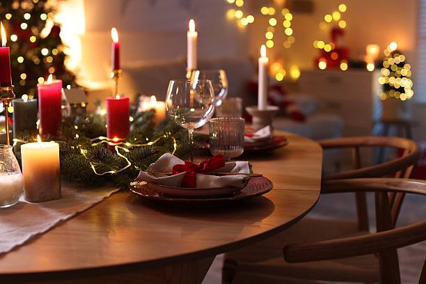 istock Festive table setting in room decorated for Christmas, closeup. Bokeh effect 2213905111