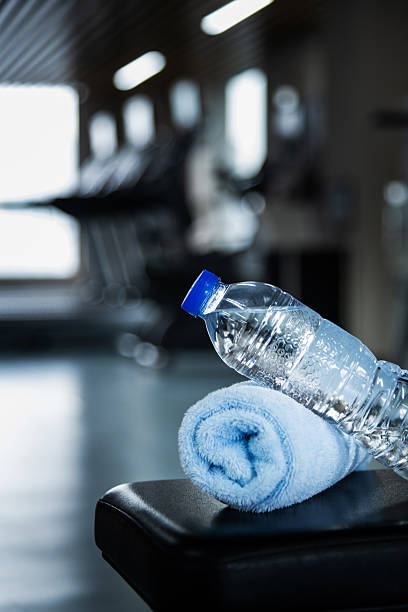 istock Towel and a bottle of water for the exercise 2213907332