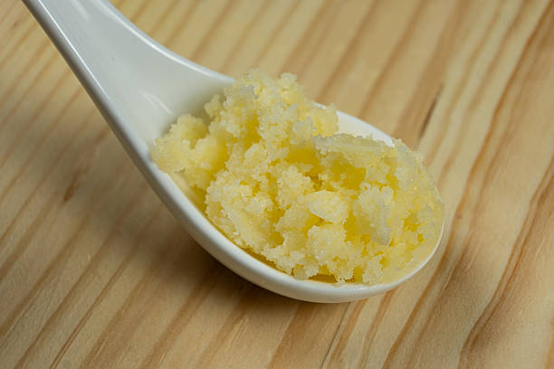istock Traditional Indian Ghee In Spoon, Golden Texture. 2213908674