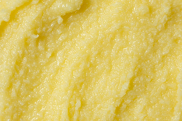 istock Shiny Golden Ghee Butter Texture Close Up Top View 2213908694