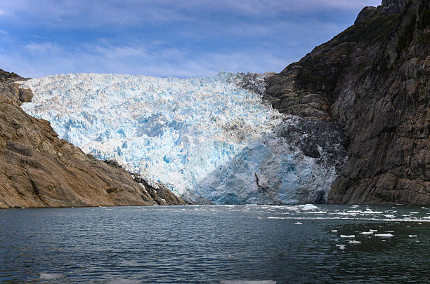 istock In Chile: A glacier in the Alberto de Agostini National Park pushing forward and calving its front. 2213913038