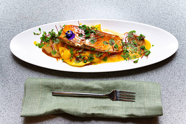 istock Gourmet salmon fillet with mango and herbs. 2213917621