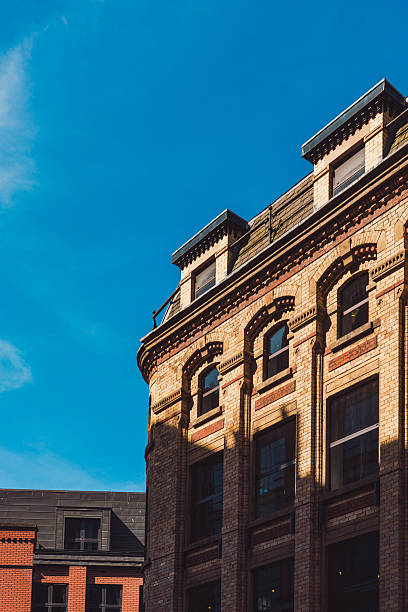 istock Elegant brick building in liverpool, england, basking in sunlight 2213917880
