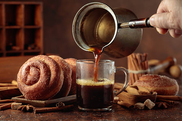 istock Swedish cinnamon rolls and black coffee. 2213922246