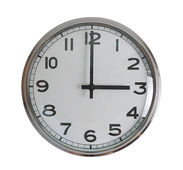 istock Wall hanging analog clock with white face and black number in classic vintage design which clock arm at 3 o'clock. Background isolated cutout in white background. 2213923882