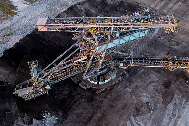 Aerial view of a lignite surface mine with a giant bucket-crawler excavator.