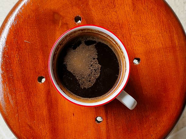 istock Indonesian black coffee occurs on a wooden table 2213927140