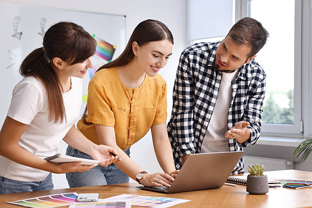 istock Group of designers working together in office 2213927868
