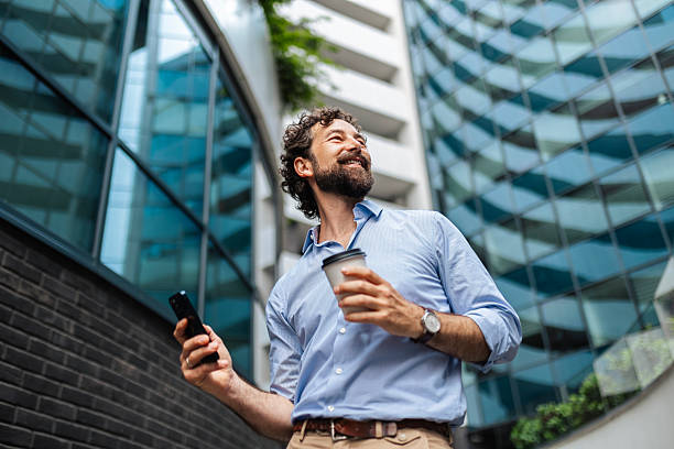 istock Professional Man Enjoying Coffee Break with Mobile Phone 2213933339