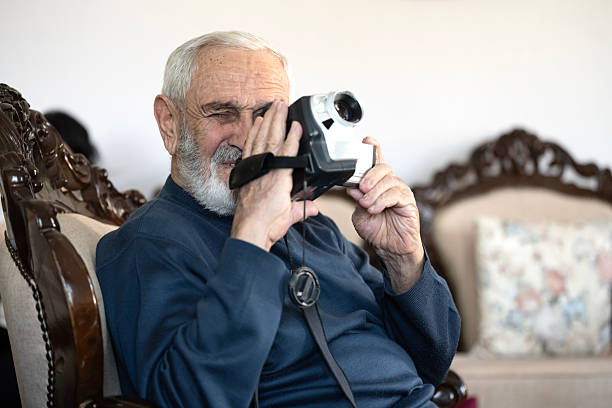 istock Portrait of a man with a video camera 2213933884