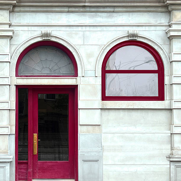 istock Elegant Red Door with Arched Windows in Historic Chicago Facade 2213937043