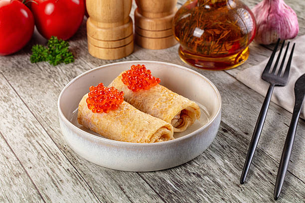istock Gourmet Panccakes with red caviar 2213939179