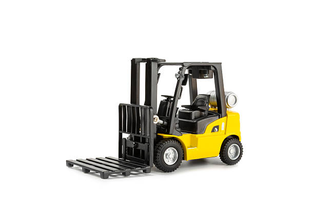 istock Yellow forklift isolated on white background. Logistics concept. Logistics and supply chain management for online shopping concept. Delivery of goods or products to the store worldwide. Cardboard box. 2213943532
