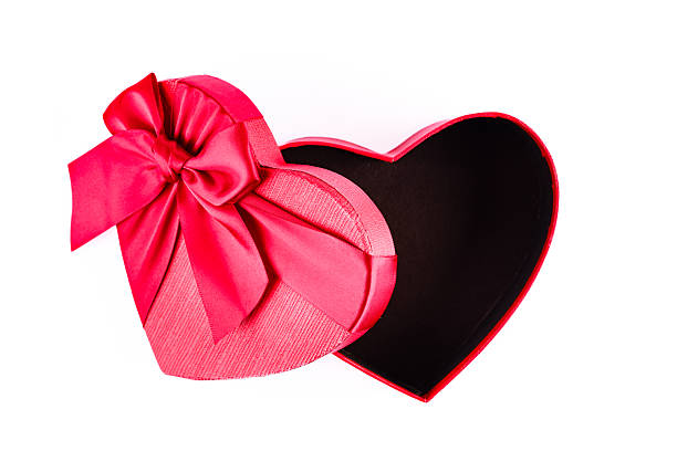 istock Red and heart shaped chocolate or candy box on white background 2213946395