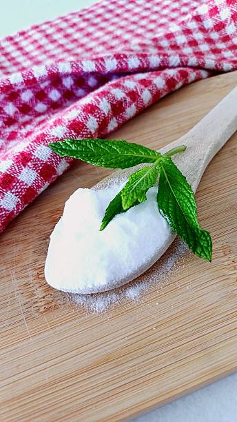 istock Baking soda.  A spoon of baking soda. 2213946804