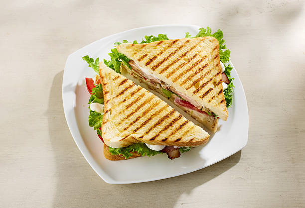 istock club sandwich on white plate 2213951186