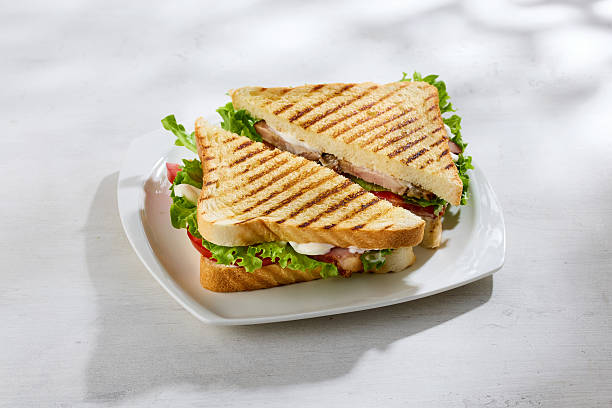 istock club sandwich on white plate 2213951208