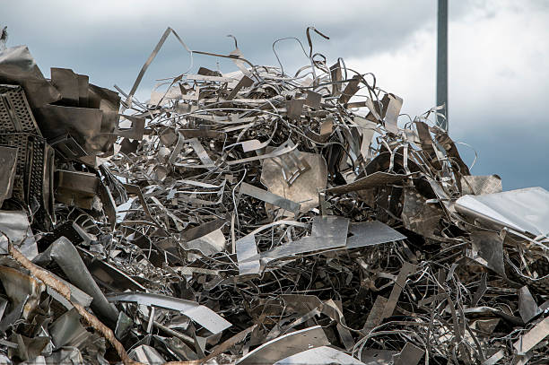 istock Scrap metal heap. Discarded material sorted and  prepared for recycling. 2213952530