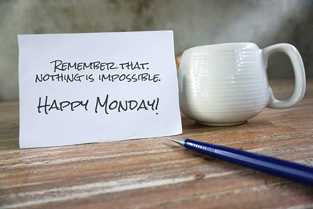 Monday inspirational text message on the table - Remember that nothing's impossible. Happy Monday.