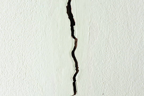 istock Crack or damage on concrete wall need repair. 2213966799