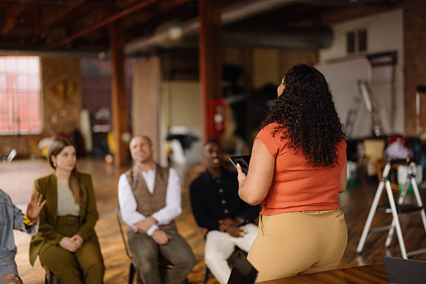 istock Creative director leading a business meeting in a modern office 2213968609