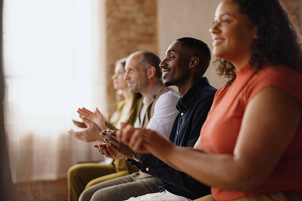istock Diverse Audience Clapping in Appreciation at a Presentation 2213968616